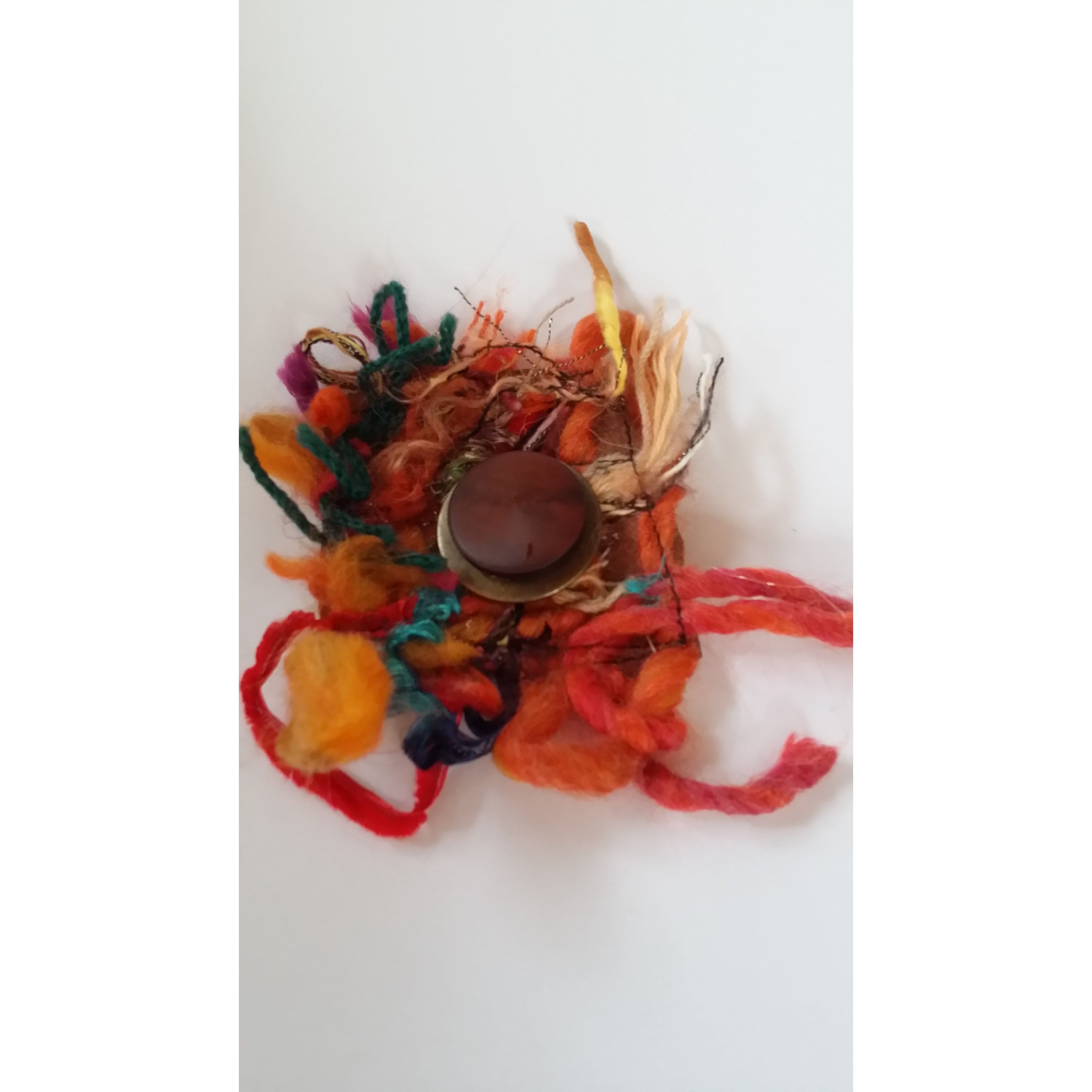 Brooch- Pin onto head wear or Knitwear-With Retro Button- Eclectic mix of textiles