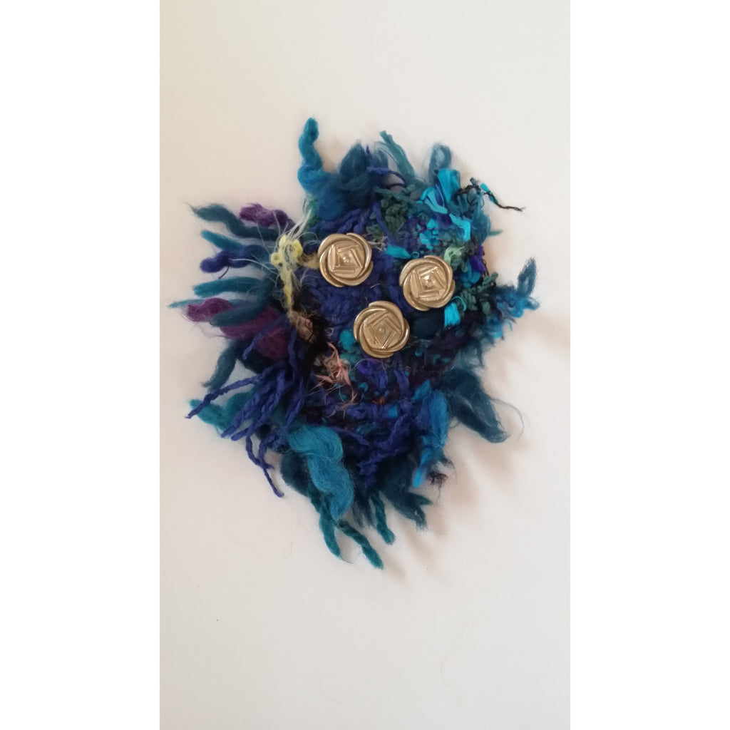 Brooch- Pin onto head wear or Knitwear-With Retro Button- Eclectic mix of textiles