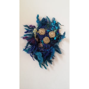 Brooch- Pin onto head wear or Knitwear-With Retro Button- Eclectic mix of textiles